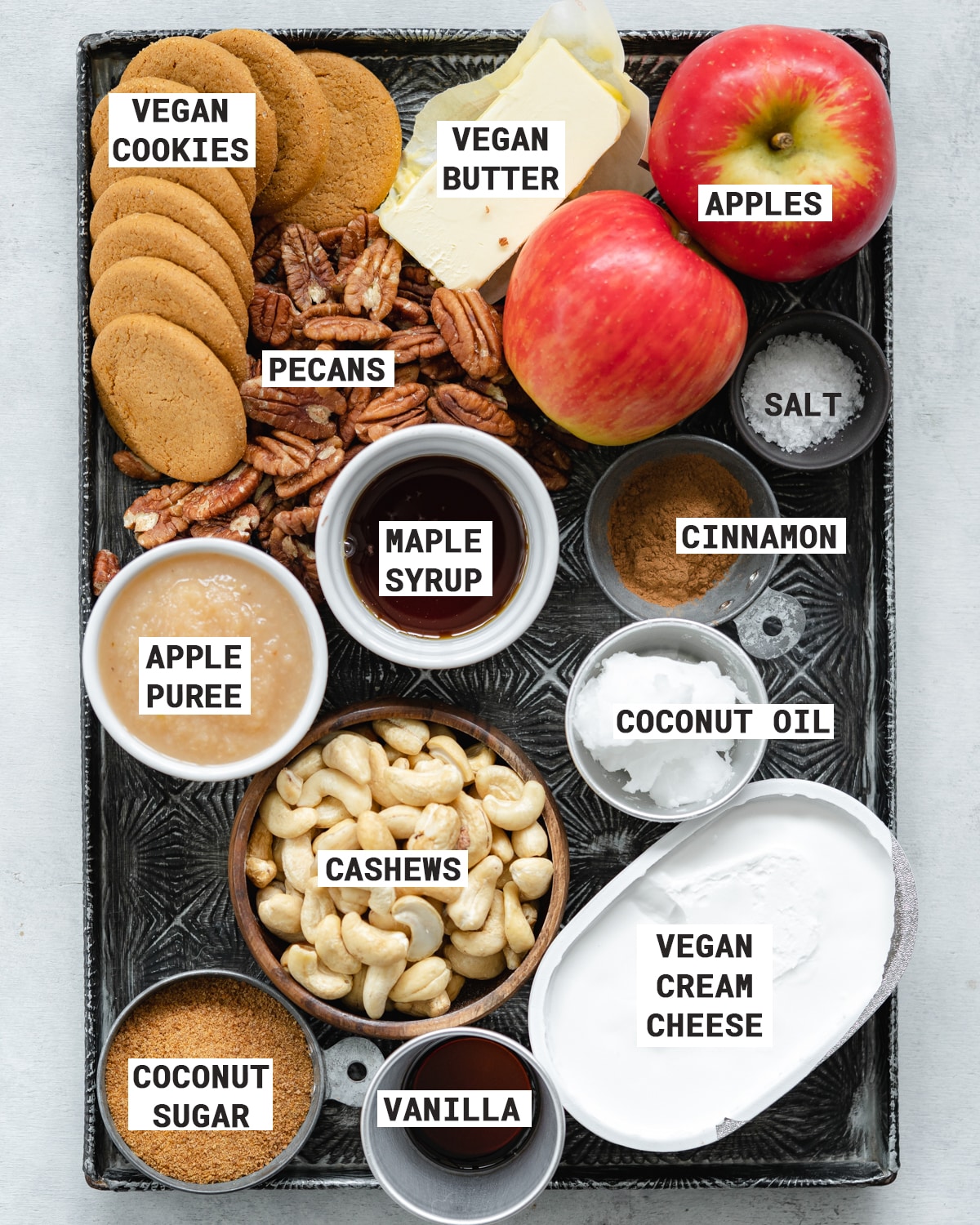 tray of ingredients to make vegan apple caramel cheesecake.
