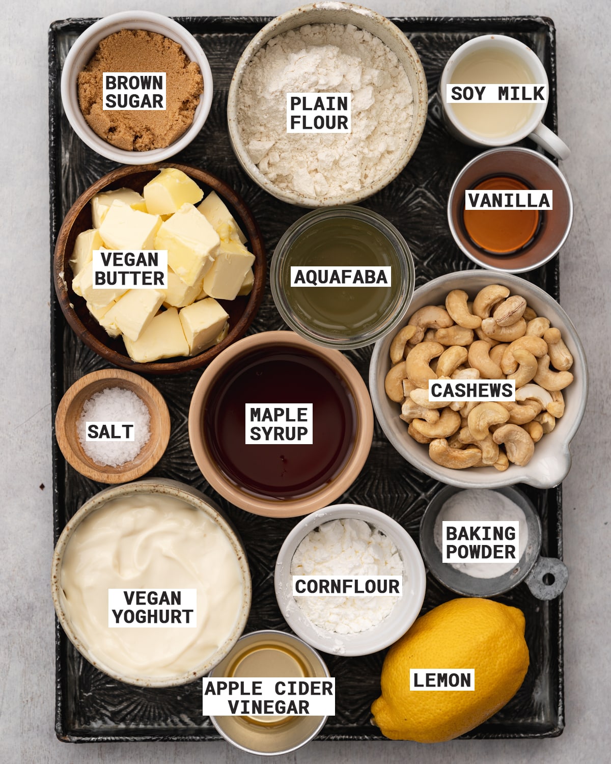 tray of ingredients for making vegan baked cheesecake.