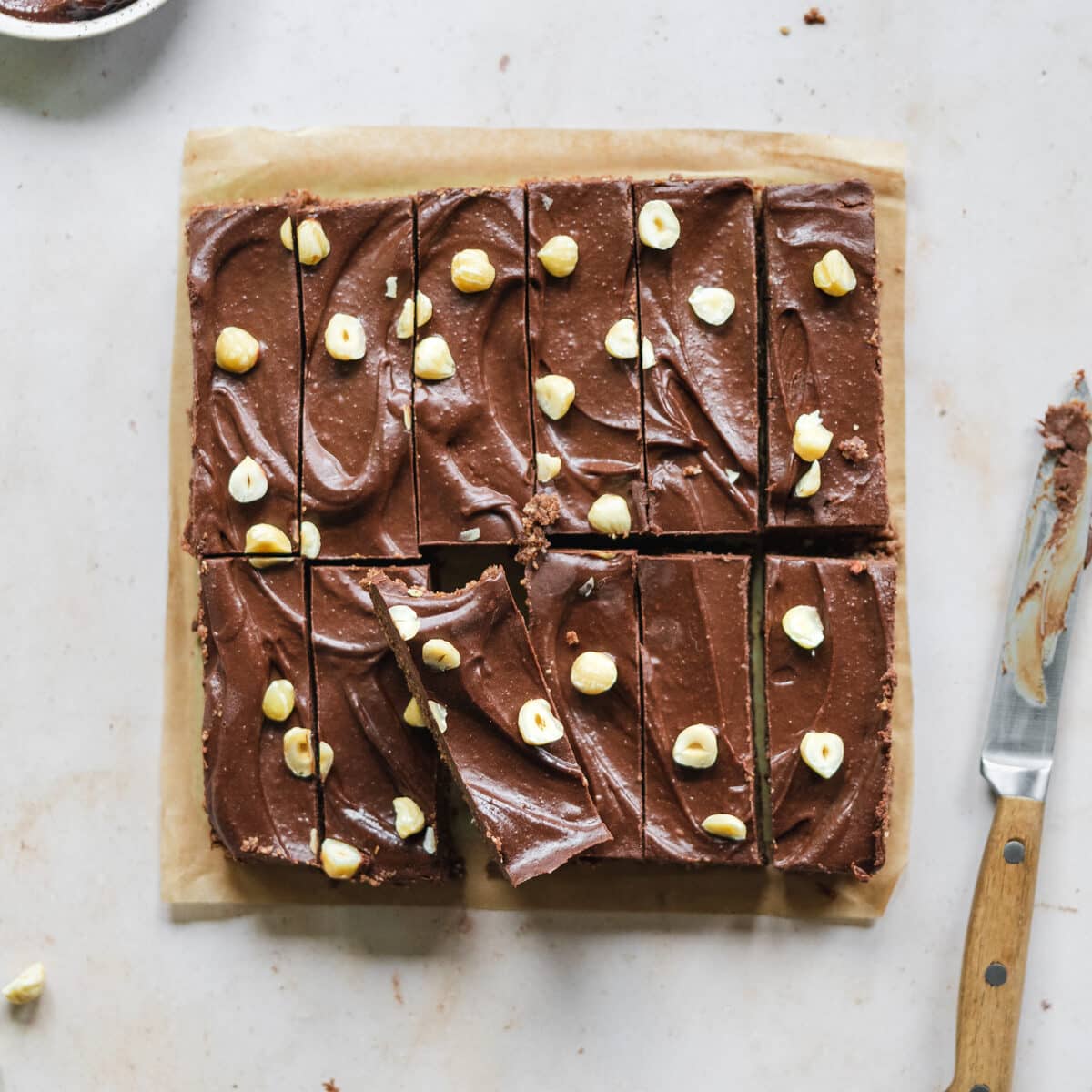 flatlay of no bake nutella slices with knife.