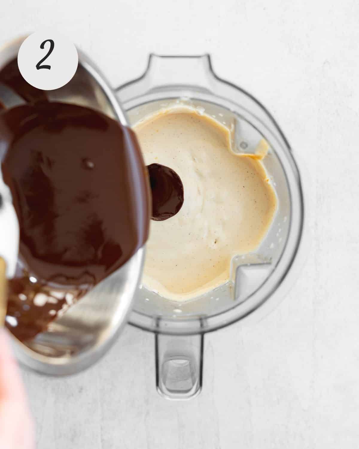 pouring melted chocolate into blender.