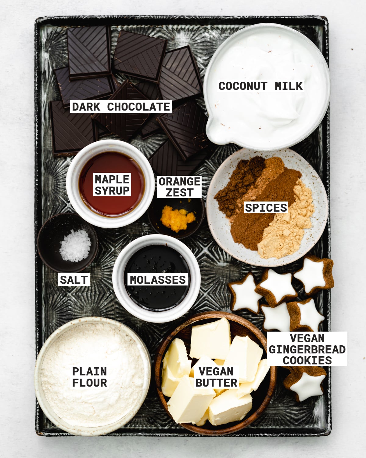 tray of ingredients to make a vegan chocolate tart with gingerbread crust.